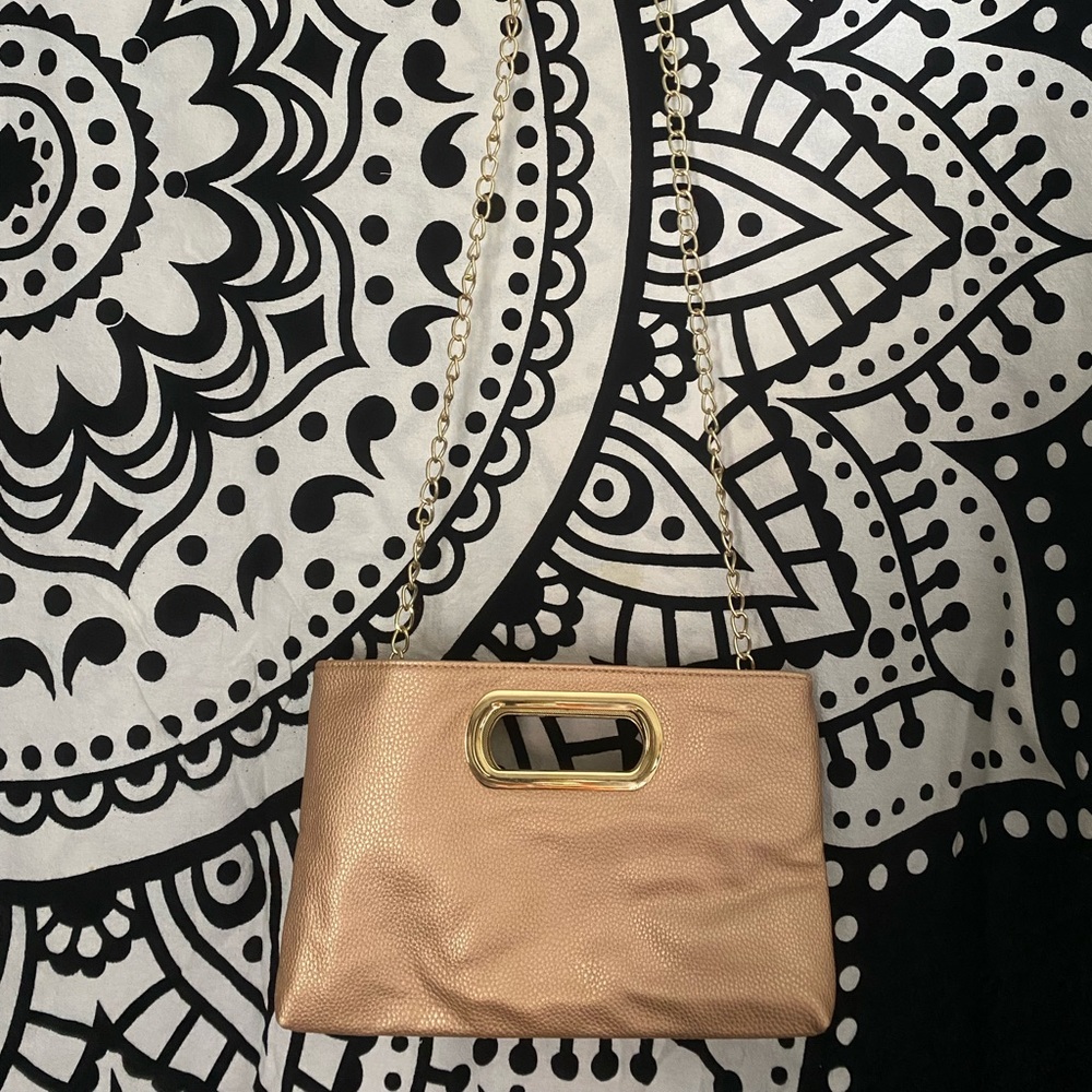 Charming Charlie rose gold clutch bag or crossbody